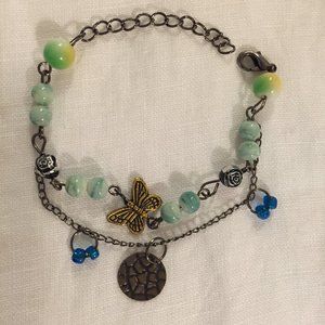 Sweet bracelet with butterfly and green beads